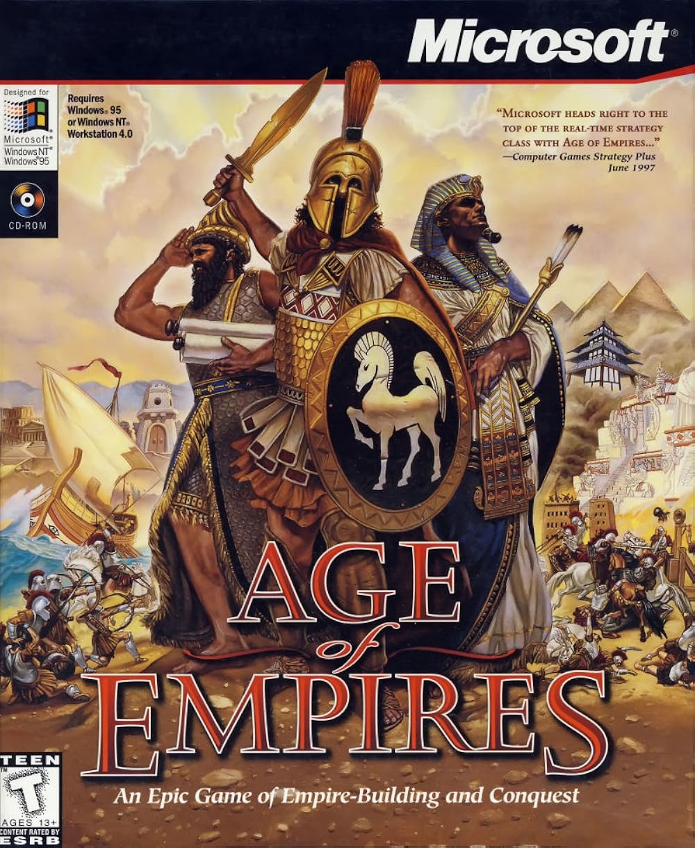La copertina del primo Age of Empires (1997): tre guerrieri, un impero da costruire.