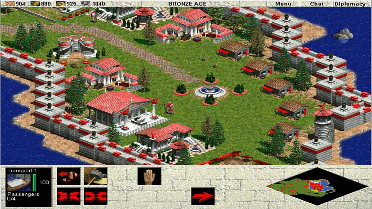 Torniamo al primo Age of Empires: mura, torri e una città costruita decisione dopo decisione.