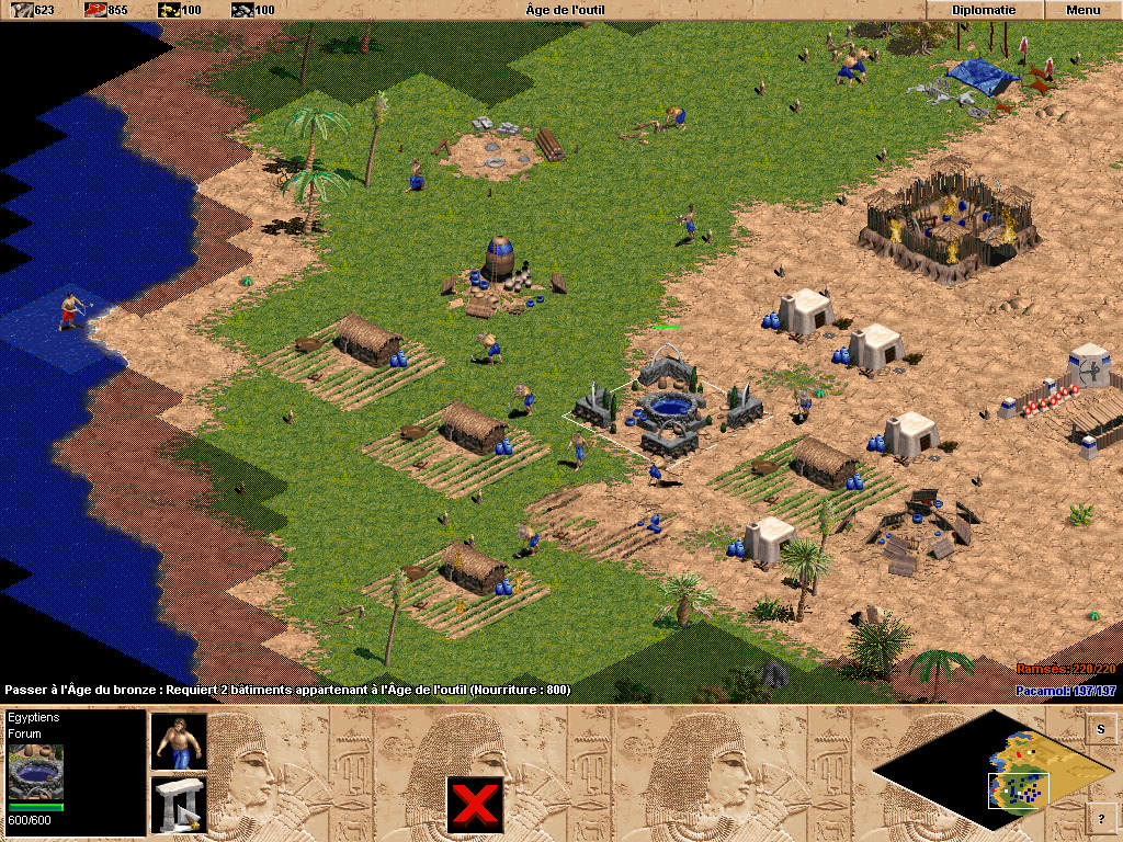 Age of Empires (1997): il villaggio, le risorse e i primi abitanti. Interfaccia originale, versione francese.